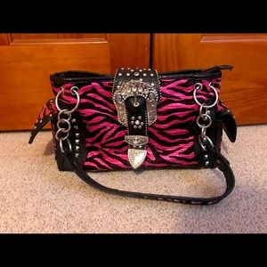 Pink and black purse
